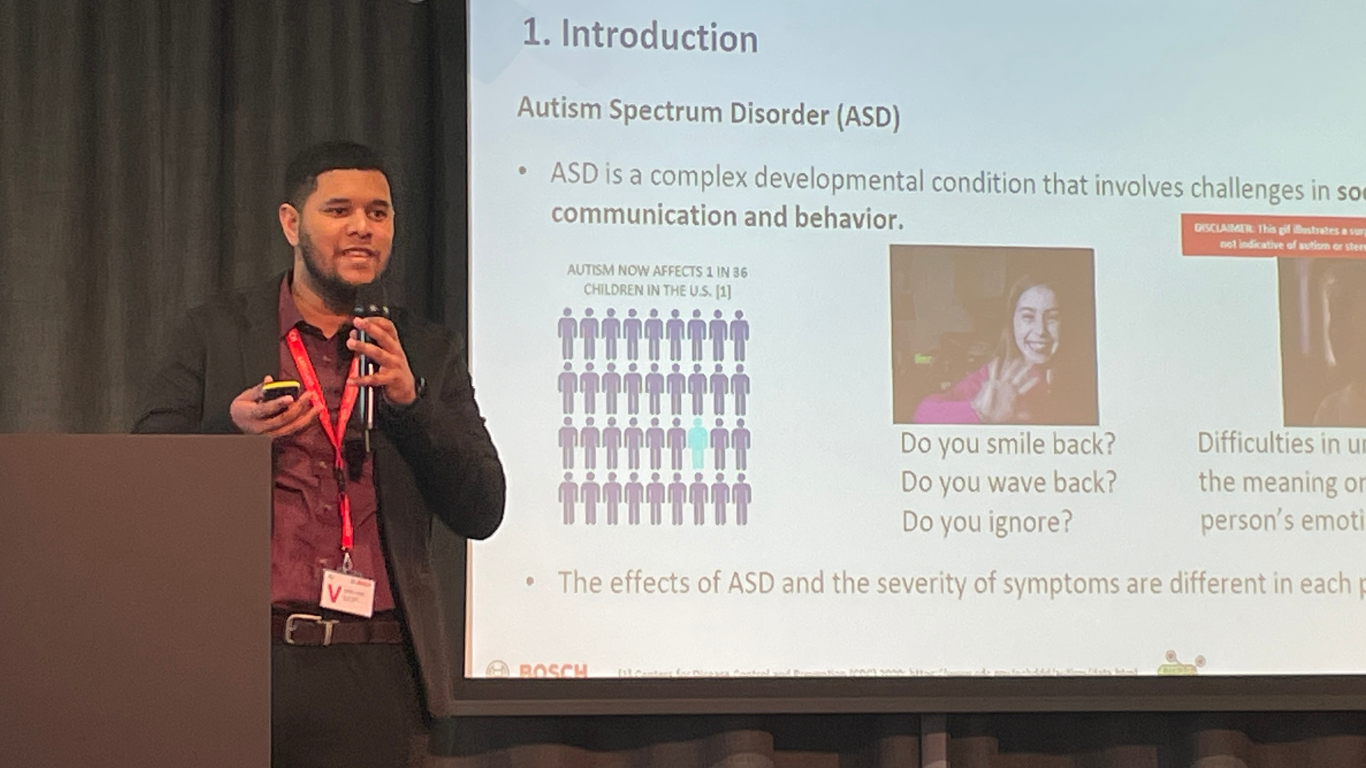 Bruno Melício presenting autism research at a scientific event